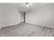 Spacious bedroom with hardwood floors and ceiling fan at 901 Palomino Pl, Bargersville, IN 46106