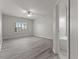 Bright bedroom featuring hardwood floors and a ceiling fan at 901 Palomino Pl, Bargersville, IN 46106