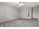 Spacious bedroom with hardwood floors and ceiling fan at 901 Palomino Pl, Bargersville, IN 46106