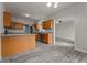 An open kitchen featuring stainless steel appliances, granite countertops and wooden cabinets at 901 Palomino Pl, Bargersville, IN 46106