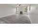Living room featuring hardwood floors, fireplace and abundant natural light at 901 Palomino Pl, Bargersville, IN 46106