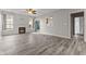 Living room featuring hardwood floors, fireplace and an open layout at 901 Palomino Pl, Bargersville, IN 46106