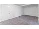 Neutral bedroom featuring gray carpet and ample closet space, with an interior door at 920 E 62Nd St # Apt M7, Indianapolis, IN 46220