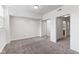 Neutral bedroom with soft carpet, ensuite bathroom, and a sliding mirrored door closet at 920 E 62Nd St # Apt M7, Indianapolis, IN 46220