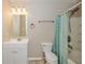Well-lit bathroom featuring a shower-tub combo with an updated vanity and light fixture at 9307 W Dockside Cir, Pendleton, IN 46064