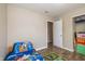 Comfortable bedroom featuring laminate floors, a themed comforter, and a closet at 9307 W Dockside Cir, Pendleton, IN 46064