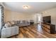 Cozy living room featuring a sectional sofa and modern décor, offering a comfortable and inviting space for relaxation at 9307 W Dockside Cir, Pendleton, IN 46064