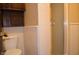 Bathroom with a toilet and glass enclosed shower at 931 Beech Dr, Greenwood, IN 46142