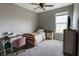Bright bedroom with a desk, bed, and modern decor at 932 Sagittarius Ave, Franklin, IN 46131