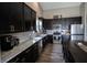 Kitchen featuring stainless steel appliances, ample cabinetry, and marble countertops at 932 Sagittarius Ave, Franklin, IN 46131