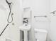 Efficient bathroom with functional vanity, toilet, and shower stall at 979 Monroe St, Indianapolis, IN 46229