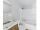 Bathroom featuring a bathtub, a toilet, and a vanity sink with a mirror, offering essential amenities at 979 Monroe St, Indianapolis, IN 46229