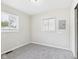 Neutral bedroom with large windows and closet for ample natural light and storage at 979 Monroe St, Indianapolis, IN 46229