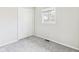 Bedroom featuring a window and closet at 979 Monroe St, Indianapolis, IN 46229