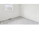 Neutral bedroom featuring a window for natural light at 979 Monroe St, Indianapolis, IN 46229