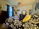 Comfortable bedroom featuring a full-size bed, dresser, mirror, and natural light at 1018 Redwood Dr, Lebanon, IN 46052