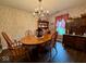 Elegant dining room with hardwood floors, a chandelier, and classic furniture at 1018 Redwood Dr, Lebanon, IN 46052