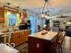 Bright kitchen with stainless steel appliances, a breakfast bar, and an open view of the living area at 1018 Redwood Dr, Lebanon, IN 46052