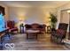 Spacious living room with classic furniture, hardwood floors, and an open layout at 1018 Redwood Dr, Lebanon, IN 46052