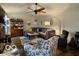 Spacious living room featuring comfortable couches, a ceiling fan, and stylish decor at 1018 Redwood Dr, Lebanon, IN 46052