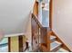 Wooden stairs leading to the basement and kitchen area at 1029 E Yoke St, Indianapolis, IN 46203