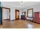Spacious bedroom featuring hardwood floors, natural light, and classic wood trim at 1029 E Yoke St, Indianapolis, IN 46203