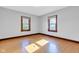 Bright bedroom with hardwood floors and stained glass windows at 1029 E Yoke St, Indianapolis, IN 46203
