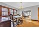 Elegant dining room featuring hardwood floors, leaded glass windows and beautiful archway at 1029 E Yoke St, Indianapolis, IN 46203