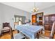 Bright dining room with hardwood floors, chandelier, and classic furnishings at 1029 E Yoke St, Indianapolis, IN 46203