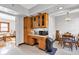Efficient kitchen with a built-in desk area, overhead cabinetry, and dining nook at 1029 E Yoke St, Indianapolis, IN 46203