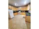 Functional kitchen with classic cabinetry, appliances, and ample counter space, ready for culinary creations at 1050 Jefferson Ave, Indianapolis, IN 46201