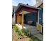 Welcoming porch with sturdy columns, a bench, and decorative touches, ideal for enjoying the outdoors at 1050 Jefferson Ave, Indianapolis, IN 46201