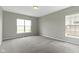 Neutral carpeted bedroom featuring windows providing natural light at 11595 Platt St, Noblesville, IN 46060