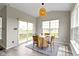 Cozy dining area with natural light, and sliding door with views of outdoor space at 11595 Platt St, Noblesville, IN 46060