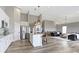 Spacious open floorplan combining kitchen, living, and dining areas, perfect for modern living and entertaining at 11595 Platt St, Noblesville, IN 46060