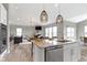 Spacious open concept connects the modern kitchen, inviting living area, creating a perfect flow at 11595 Platt St, Noblesville, IN 46060