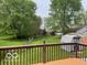 Backyard view from deck, with shed in yard at 11748 E 10Th St, Indianapolis, IN 46229