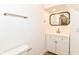 Bathroom features a vanity and framed mirror at 1234 N Dearborn St, Indianapolis, IN 46201