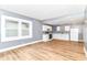 Bright open kitchen featuring white cabinets, wood floors, and ample counter space for culinary creations at 1234 N Dearborn St, Indianapolis, IN 46201