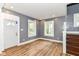 Bright living room with hardwood floors, neutral paint, and natural light through two windows at 1234 N Dearborn St, Indianapolis, IN 46201