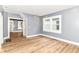 Relaxing living room featuring hardwood floors, neutral paint, and natural light for a cozy retreat at 1234 N Dearborn St, Indianapolis, IN 46201