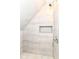 Shower features ceramic tile and recessed shampoo niche at 1234 N Dearborn St, Indianapolis, IN 46201