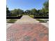 Landscaped community park with walkways, manicured hedges, and a central gazebo for gatherings at 12873 Tradd St # 2B, Carmel, IN 46032