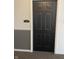 Apartment 2B door with black color and black door knob at 12873 Tradd St # 2B, Carmel, IN 46032
