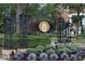 Elaborate entrance sign for The Village of Westclay with wrought iron details and landscaping at 12873 Tradd St # 2B, Carmel, IN 46032