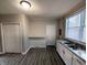 Open concept kitchen with breakfast bar, pantry and plentiful cabinets and counter space at 1303 9Th St, Columbus, IN 47201