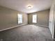 Spacious main bedroom with new carpets, neutral colors, closets and lots of natural light at 1303 9Th St, Columbus, IN 47201