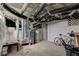 This unfinished basement offers a gas furnace, water heater, and plenty of visible pipes and ductwork at 1467 W 33Rd St, Indianapolis, IN 46208