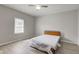 Bright bedroom with wood style flooring and a window providing natural light at 1467 W 33Rd St, Indianapolis, IN 46208