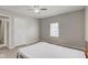 Bedroom featuring neutral walls, ceiling fan, and natural light from a window at 1467 W 33Rd St, Indianapolis, IN 46208
